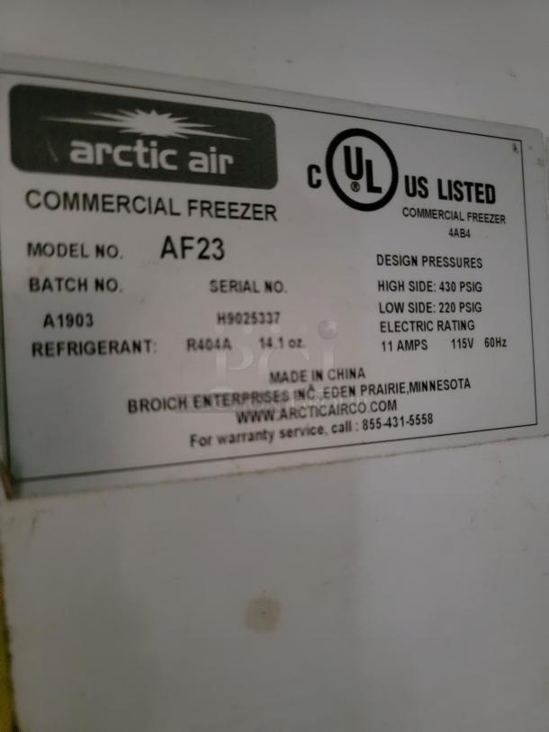 Arctic Air Commercial Freezer label showing model AF23, batch A1903, UL listed, 14.1 oz R404A refrigerant, 11 amps, 115V.