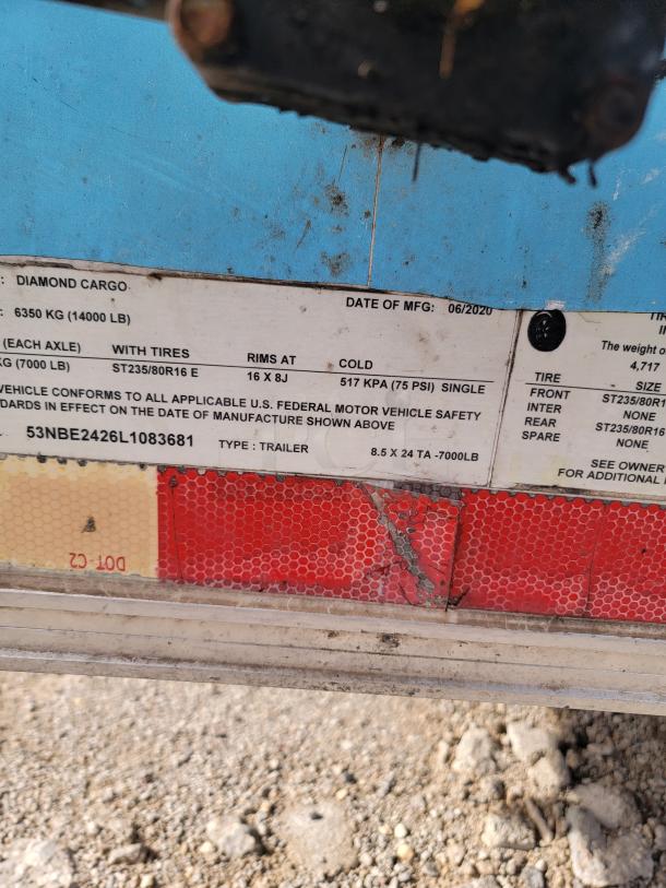 Diamond Cargo trailer label showing specs: 8.5x24 TA, 7000 lb capacity, manufactured 06/2020. Model ST235/80R16 E tires.
