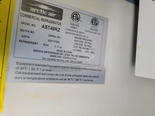Arctic Air Commercial Refrigerator label, Model AST48RZ, Serial H20117626, uses R290 refrigerant, 115V, 60Hz, 4.3 amps.