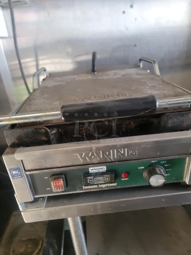 Waring Tostato Supremo commercial sandwich press, used condition, visible controls with on/off switch and temperature dial.