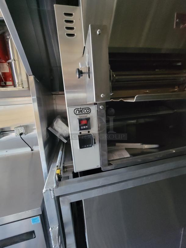 Nieco automatic broiler, stainless steel, model number 1432, used condition, visible control panel, and brand labeling.
