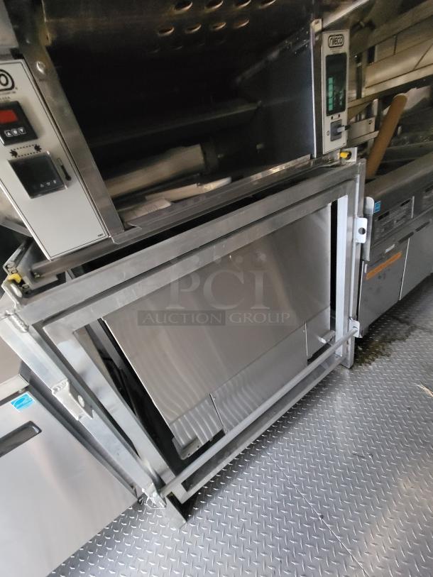 Commercial stainless steel oven by Meco with digital controls and exterior vent. Good condition, suitable for restaurant use.