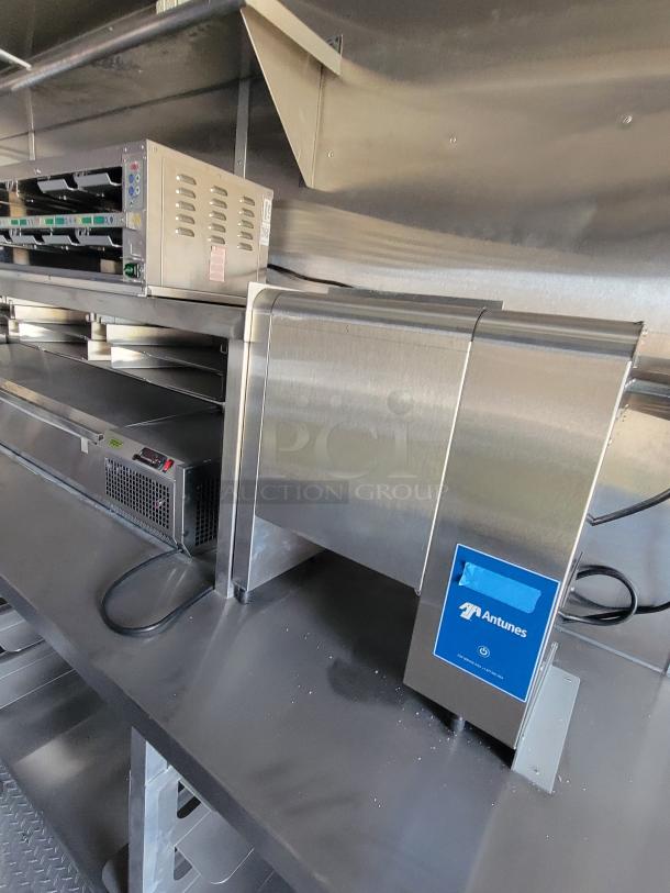 Antunes commercial toaster, stainless steel, excellent condition, visible power button.
