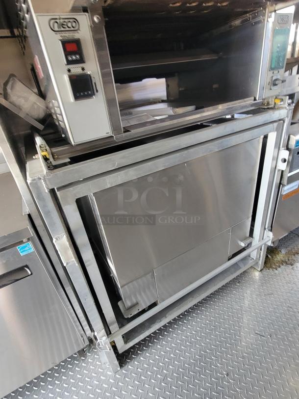 Nieco automatic broiler, stainless steel, model number visible, digital control panel, used condition.