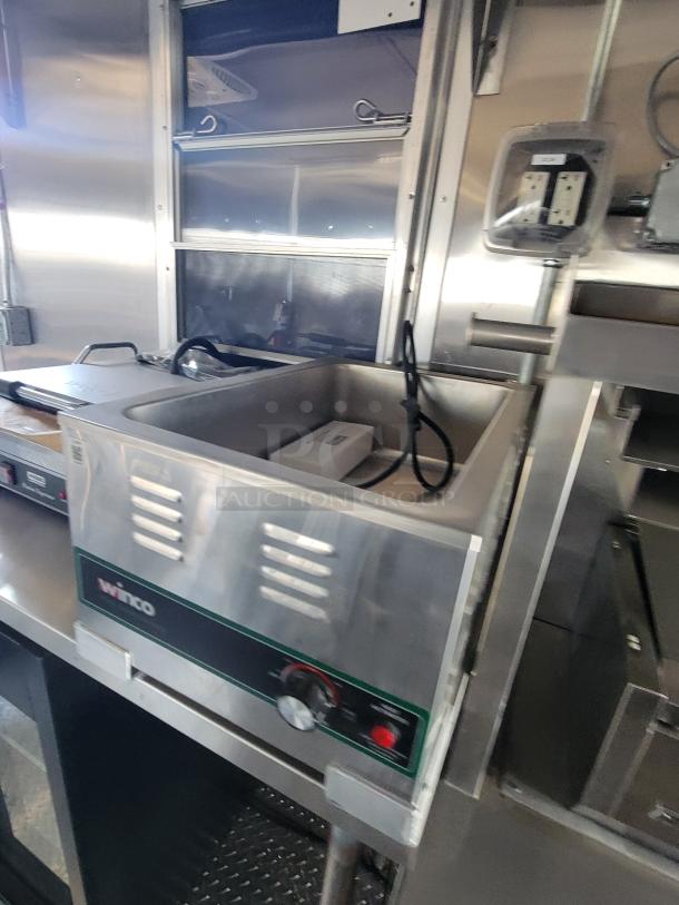Winco countertop food warmer in stainless steel, with adjustable temperature control knob and power indicator. Excellent condition.