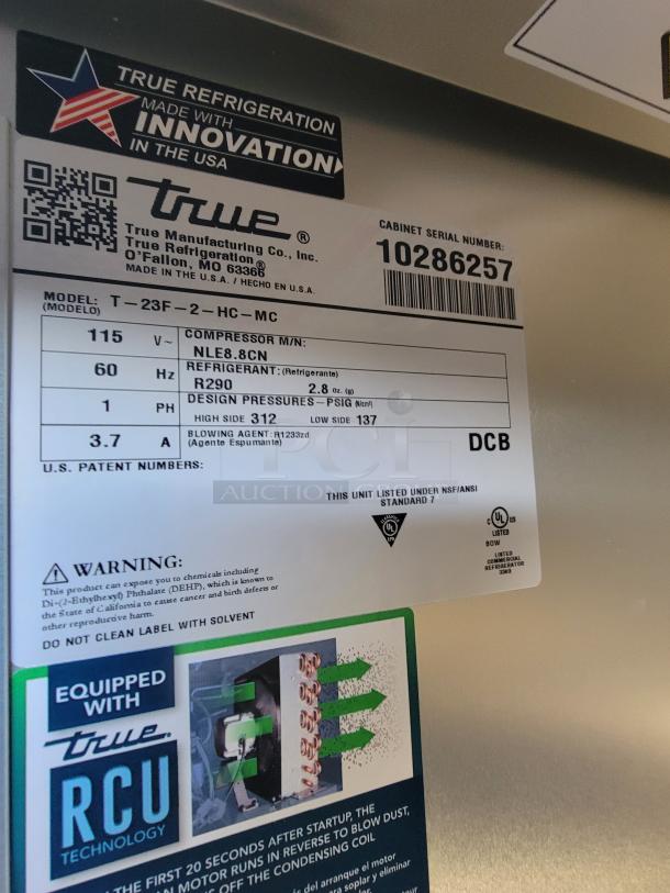 True Refrigeration label showcasing model T-23F-2-HC, 115V, R290 refrigerant. Serial number 10286257, NSF/ANSI Standard 7 listed.
