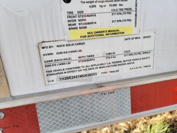 Rock Solid Cargo trailer label showing specs: 6350 kg GVWR, ST235/80R16 tires, manufactured 05/2021, VIN 7H2BE2421MD038003.