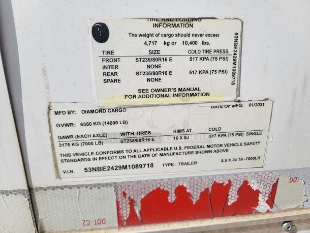 Diamond Cargo trailer label, GVWR 6350 kg, GAWR 3175 kg, size 8.5x24 TA-7000LB, tire size ST235/80R16 E, manufactured 01/2021.