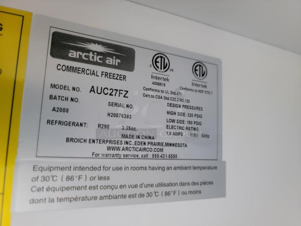 Arctic Air Commercial Freezer model AUC27FZ label showing serial H20076383, R290 refrigerant, and design pressures.
