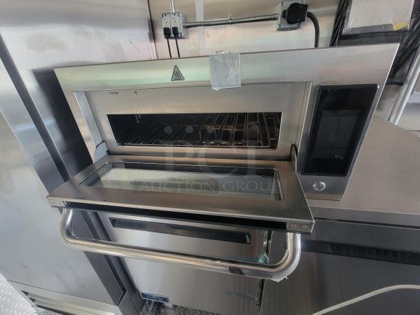 Pratica Forza 21 commercial oven, stainless steel, with glass door and digital display, brand name visible on interior.