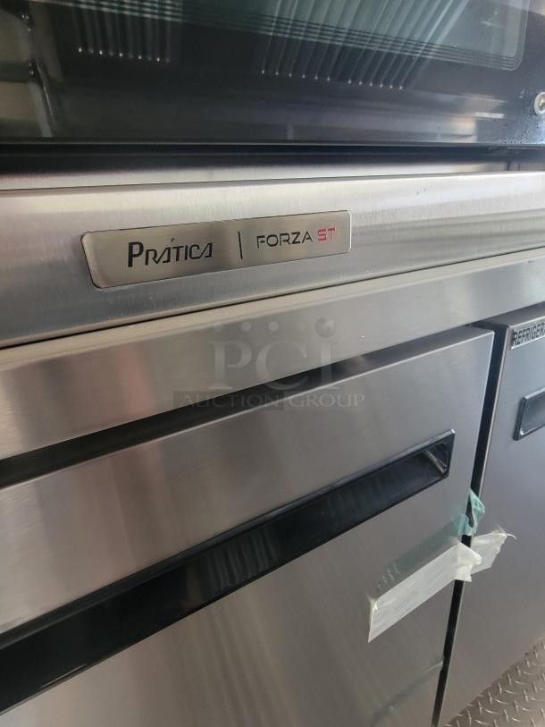 Prática Forza ST commercial oven, stainless steel, sleek design, visible logo and model, excellent condition.