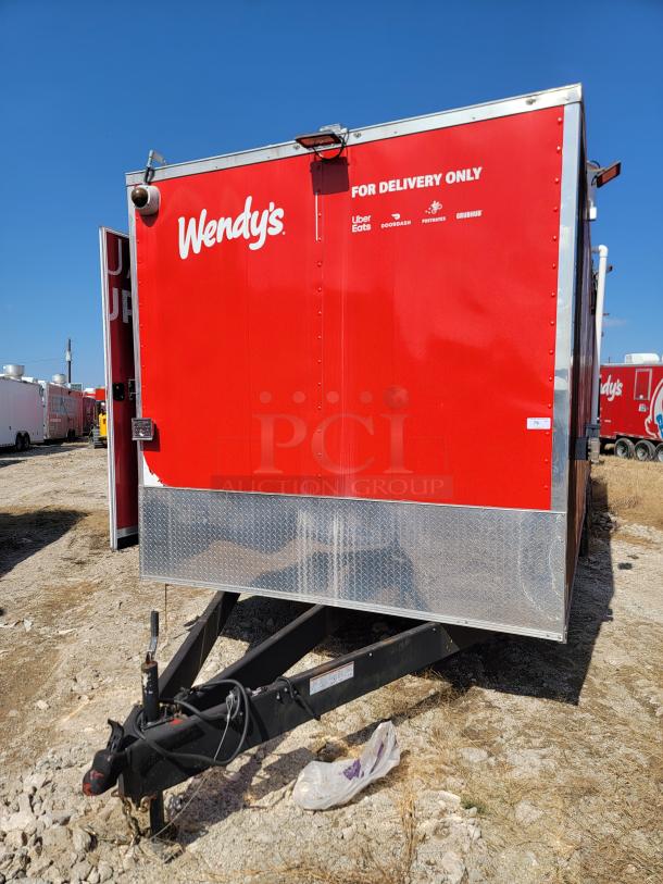 Red Wendy's delivery trailer, featuring logos for Uber Eats, DoorDash, Postmates, and Grubhub. Steel front panel with towing hitch.