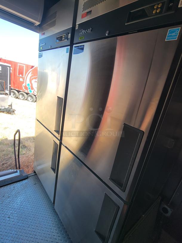 Stainless steel Turbo Air refrigerator, commercial-grade, double-door with control panel, Energy Star label, in good condition.