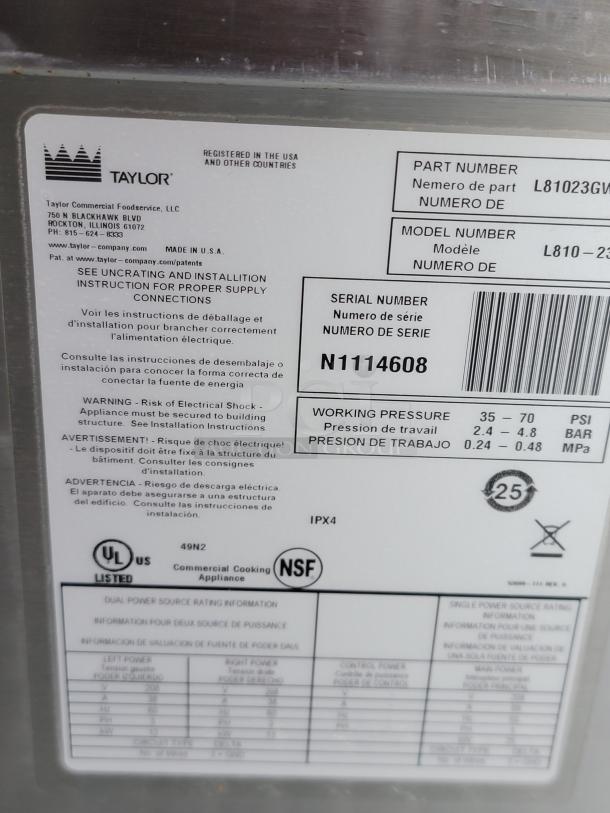 Taylor commercial appliance label, model L810-23, serial N1114608, showing installation instructions and power specifications.