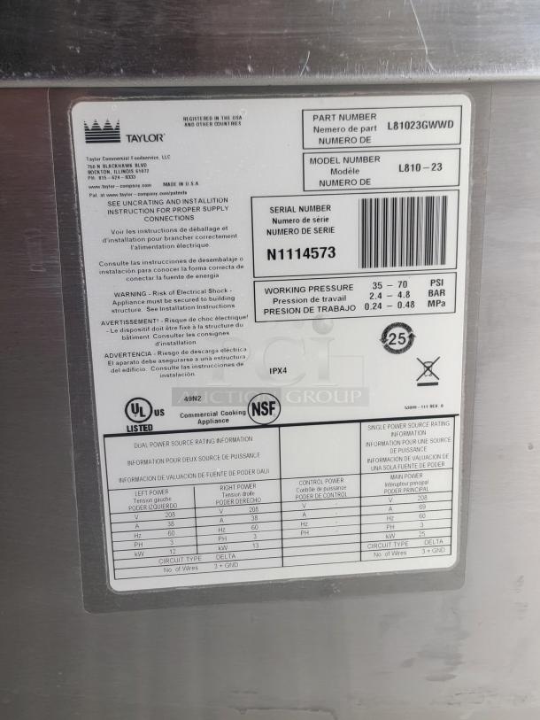 Taylor model L810-23 label; part number L81023GWWD, serial N1114573. Details electrical specs, 35-70 PSI working pressure.