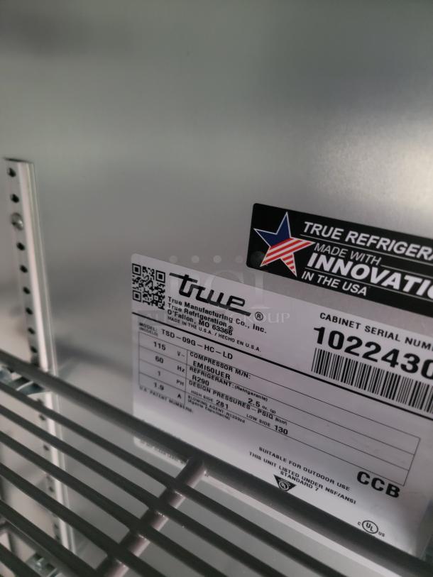 True Manufacturing refrigerator model TSD-09G-HC-LD label, showing specifications and serial number 10224300.