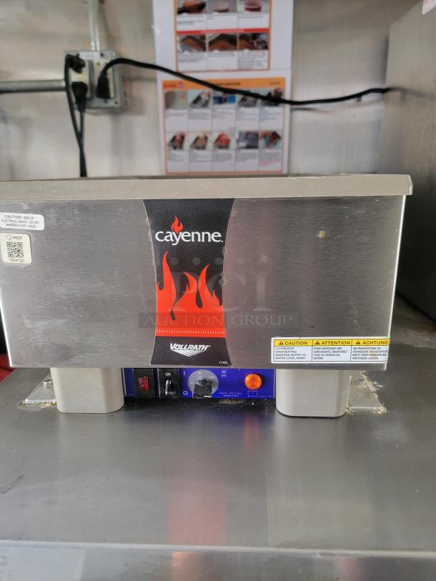 Vollrath Cayenne food warmer, model 17485. Features stainless steel body, temperature control, caution labels. Good condition.