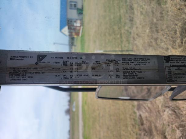Label inside a Utilimaster vehicle showing manufacturing details: GVWR 8618 kg (19000 lb), made in March 2013, incomplete vehicle by Freightliner.