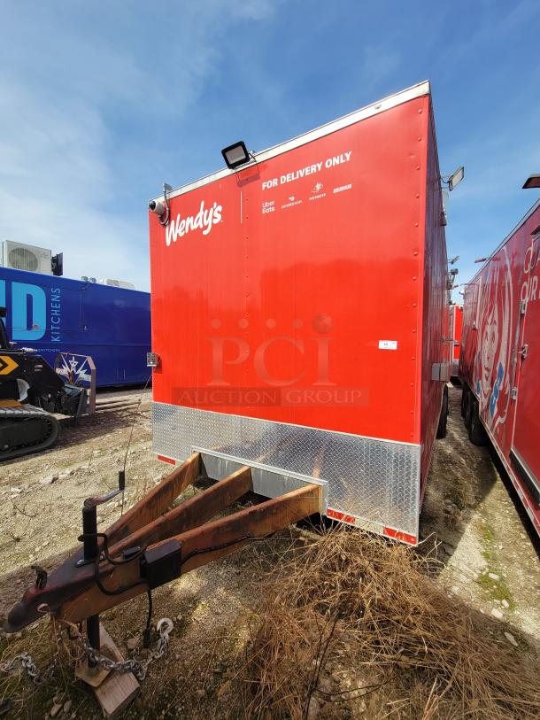 Red Wendy's food truck for delivery only, featuring UberEats, DoorDash logos. Condition shows wear on trailer hitch area.