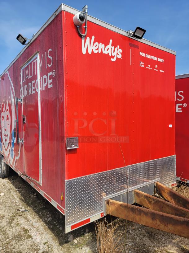 Red Wendy's delivery trailer with branding, featuring diamond plate trim. Equipped for delivery use. Markings include "For Delivery Only."