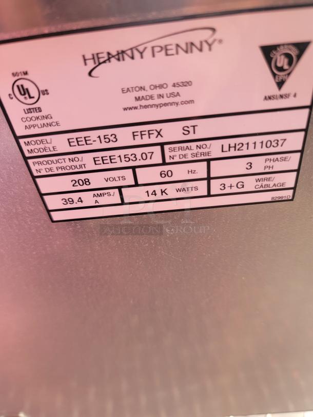 Henny Penny cooking appliance label, model EEE-153 FFFX ST, 208 volts, 14,000 watts, made in USA, serial LH211037.