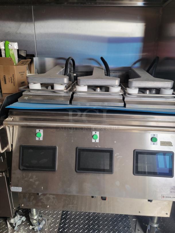 Commercial sandwich press with touchscreen controls, stainless steel build, dual pressing areas, and mobility casters for easy movement.