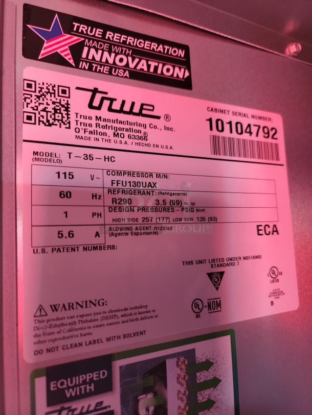 Label for True Refrigeration model T-35-HC, serial 10104792, uses R290 refrigerant. Warning about chemical exposure.