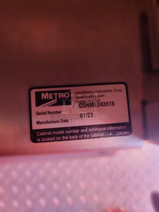 Metro cabinet label, serial C5HME043618, manufactured 01/22, by InterMetro Industries Corp, USA.