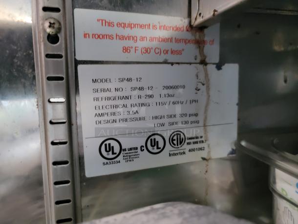 Label on equipment showing Model SP48-12, Serial SP48-12-20060010, refrigerant R-290, 115V/60Hz, 3.5A, UL listed.