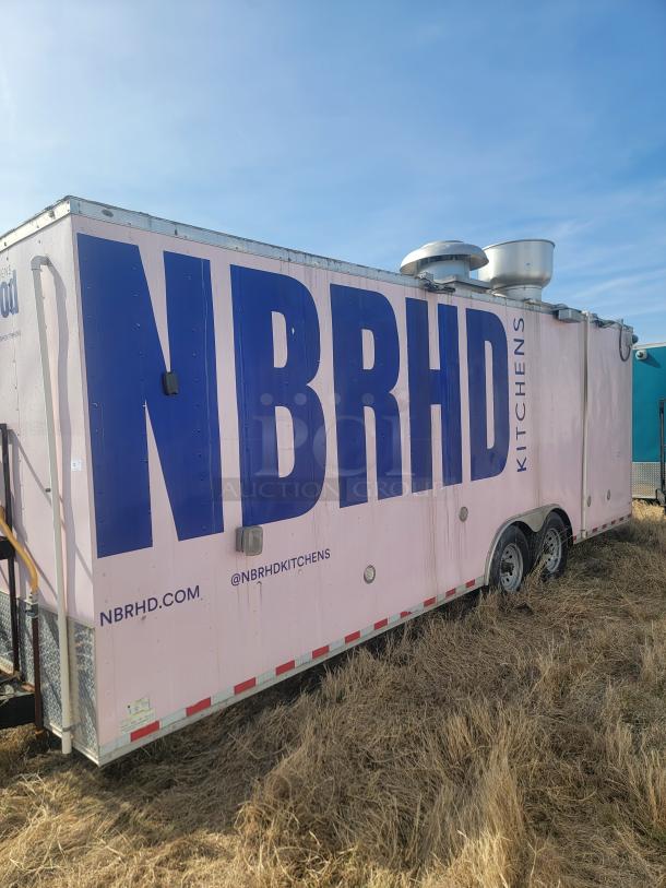 Mobile kitchen trailer with large "NBRHD KITCHENS" text, vents on top, and visible website @NBRHDKITCHENS. Used condition.