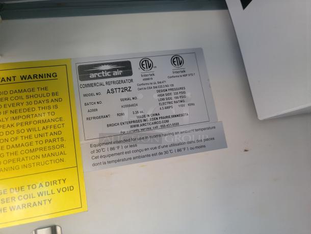 Arctic Air commercial refrigerator label, model AST72RZ, batch A2009, uses R290 refrigerant. Conforms to NSF STD 7.
