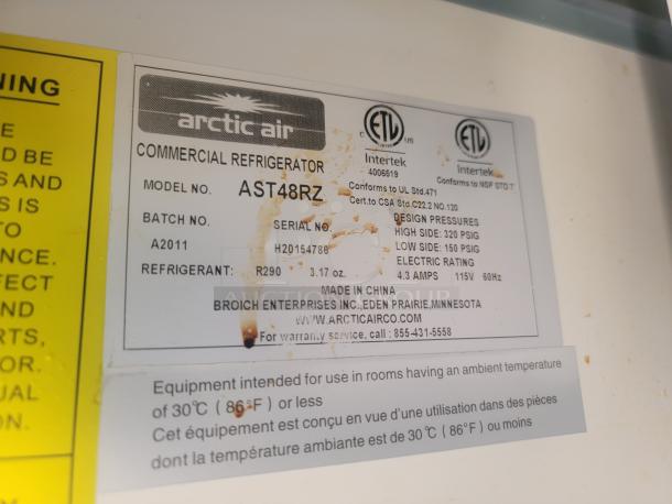 Label for Arctic Air Commercial Refrigerator, Model AST48RZ. Displays design pressures, electric rating, and refrigerant type.