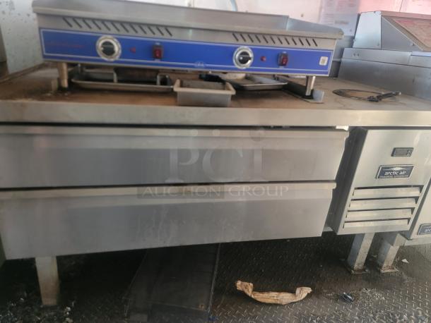 Commercial stainless steel countertop appliance with dual burners, temperature dials, and Arctic Air refrigeration unit below. Used condition.