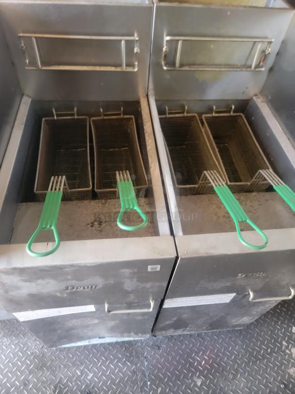 Dean double deep fryer with four baskets and green handles, stainless steel construction, visibly used condition.