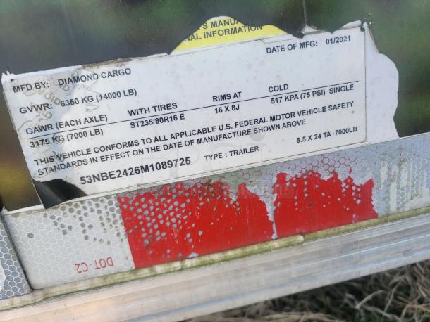 Diamond Cargo trailer label, GVWR 6350 kg, GAWR 3175 kg, tires ST235/80R16, manufactured 01/2021, type 8.5 x 24 TA -7000LB.
