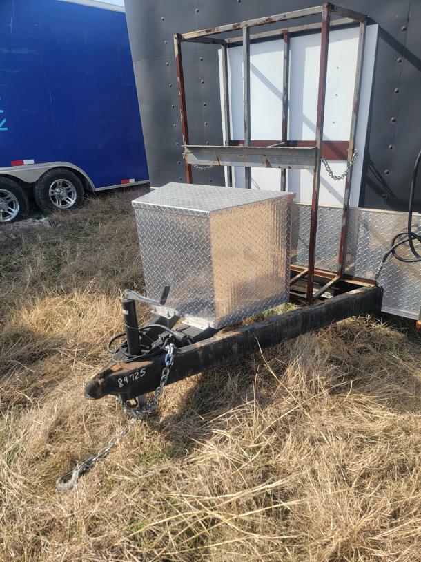 Trailer hitch with metal frame and diamond-plate utility box, marked "89725." Slightly rusted, good condition.