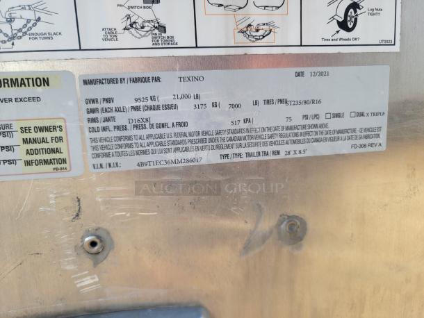 Label on a Texino trailer, manufactured 12/2021, with specs: GVWR 21,000 lbs, Rims 16x8J, Tire size T235/80/R16, Type 28' x 8.5'.