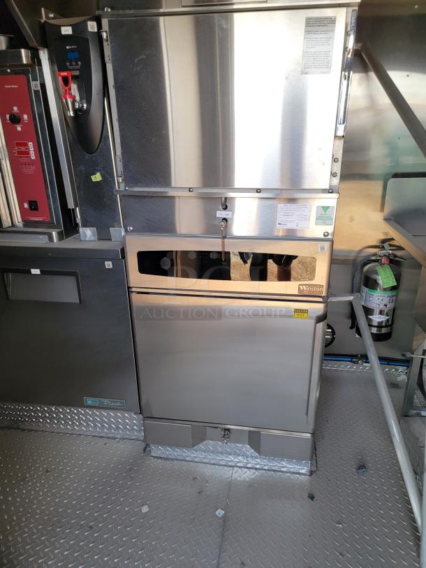 Commercial stainless steel warming cabinet. Features indicator lights, temperature controls, and safety labels. Good condition.