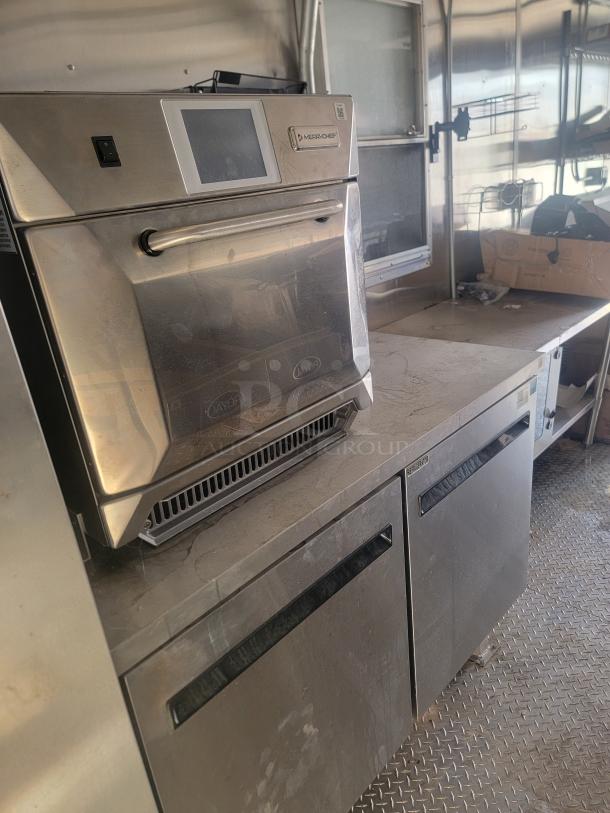 Merco Chef rapid cook oven, stainless steel, digital display, in used condition, visible wear.