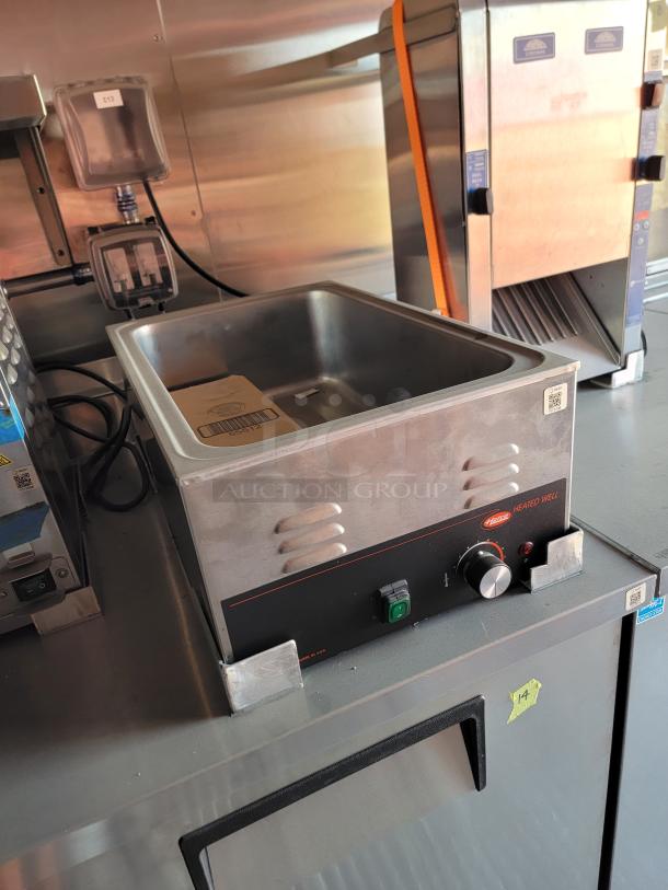 Alto-Shaam heated well, stainless steel, front control knob, good condition, visible QR code and power switch.