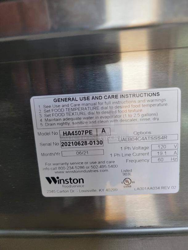 Winston foodservice appliance model HA4507PE with care instructions and serial number 20210628-0130 on metal surface.