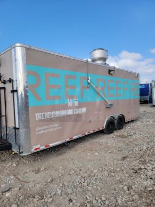 Mobile kitchen trailer with "REEF" branding, tan and teal, dual axles, rooftop ventilation, contact info: @reeftechnology.