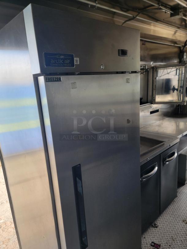 Commercial Arctic Air freezer in good condition with stainless steel finish, labeled "FREEZER," suitable for professional kitchens.