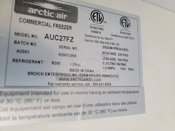 Arctic Air Commercial Freezer model AUC27FZ label. Shows batch, serial number, refrigerant R290, and design pressures.