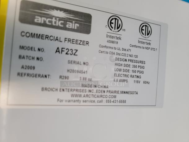 Arctic Air commercial freezer model AF23Z, serial H20094541, using R290 refrigerant, conforms to UL and NSF standards.