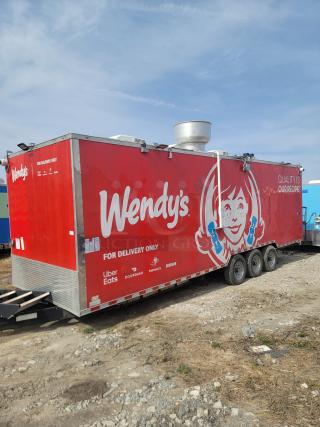 Wendy's branded food trailer, red with logo, "For Delivery Only" marked, compact design, clean condition, equipped for service.