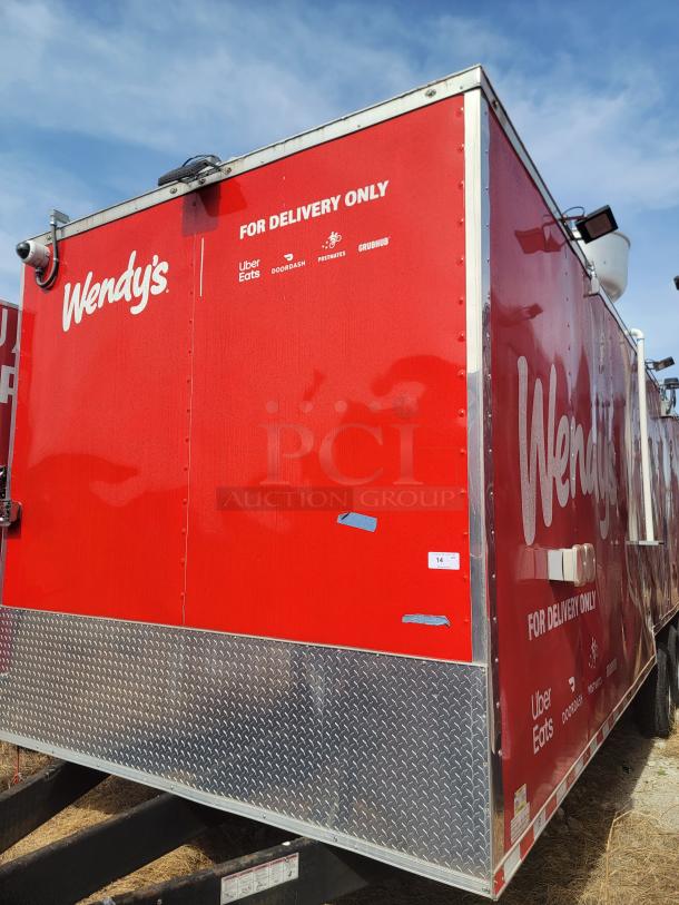 Red Wendy's mobile kitchen trailer, marked "For Delivery Only," features logos for Uber Eats, DoorDash, Postmates, and Grubhub.