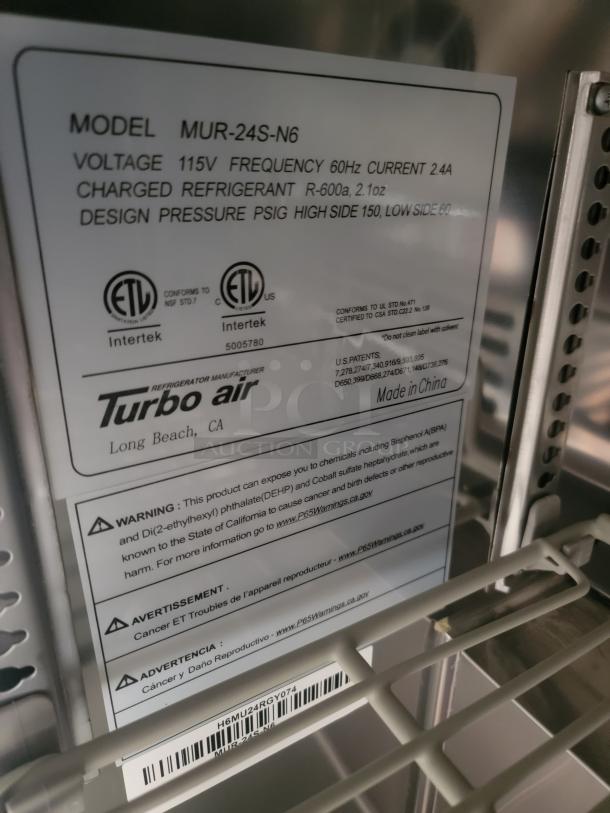 Turbo Air model MUR-24S-N6 refrigeration unit label showing voltage, frequency, refrigerant type, safety warnings, and manufacturing details.