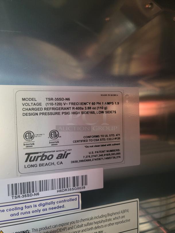 Turbo Air refrigerator label, model TSR-35SD-N6. Shows specifications: voltage, refrigerant, design pressure, and certification info.