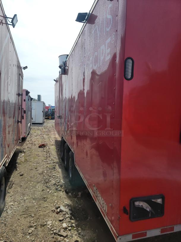 Red food trailer with three axles, side ventilation, exterior lights, and visible wear. Partial label reads "RECIPE." License plate GS8781.
